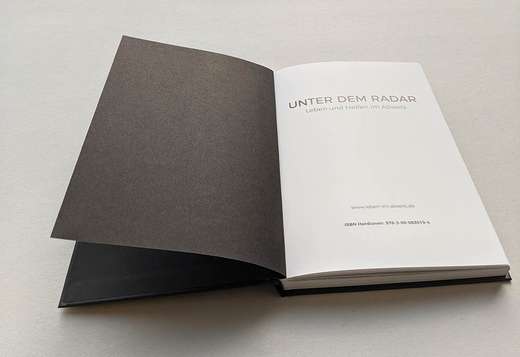 Buch aufgeschlagen Buch aufgeschlagen von Langebartes + Jürgens Hamburg GmbH